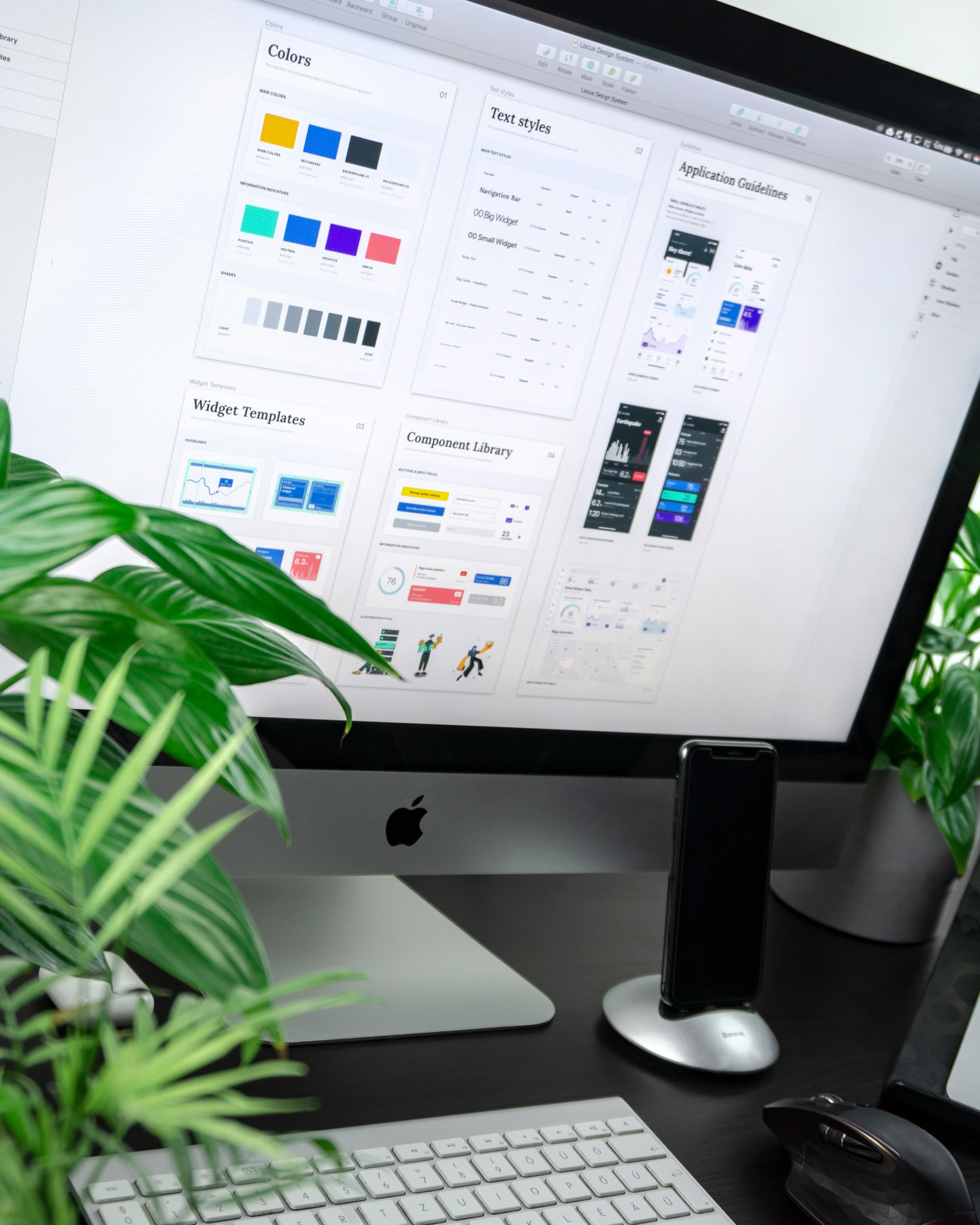 Digitaal design system met kleurpalet, typografie en componenten op een scherm
